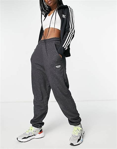 adidas originals ryv shrug jumper in black|adidas 3 stripe joggers.